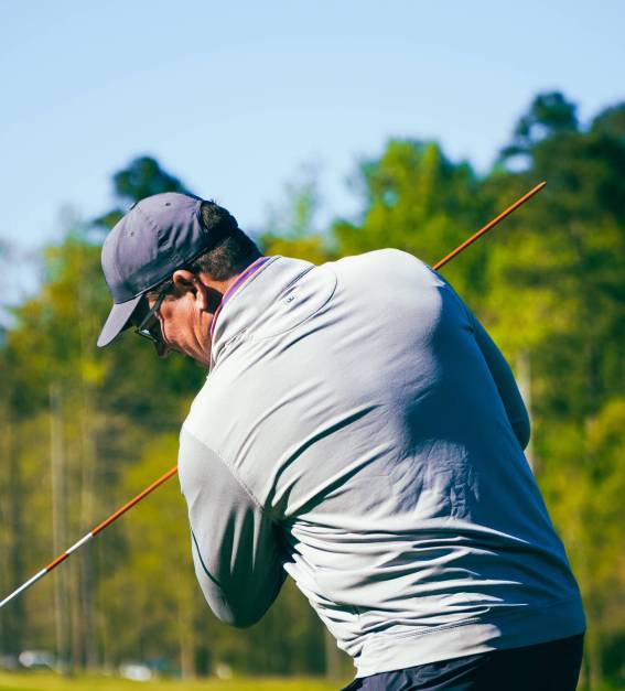 Chad Gibbs showing a golf drill
